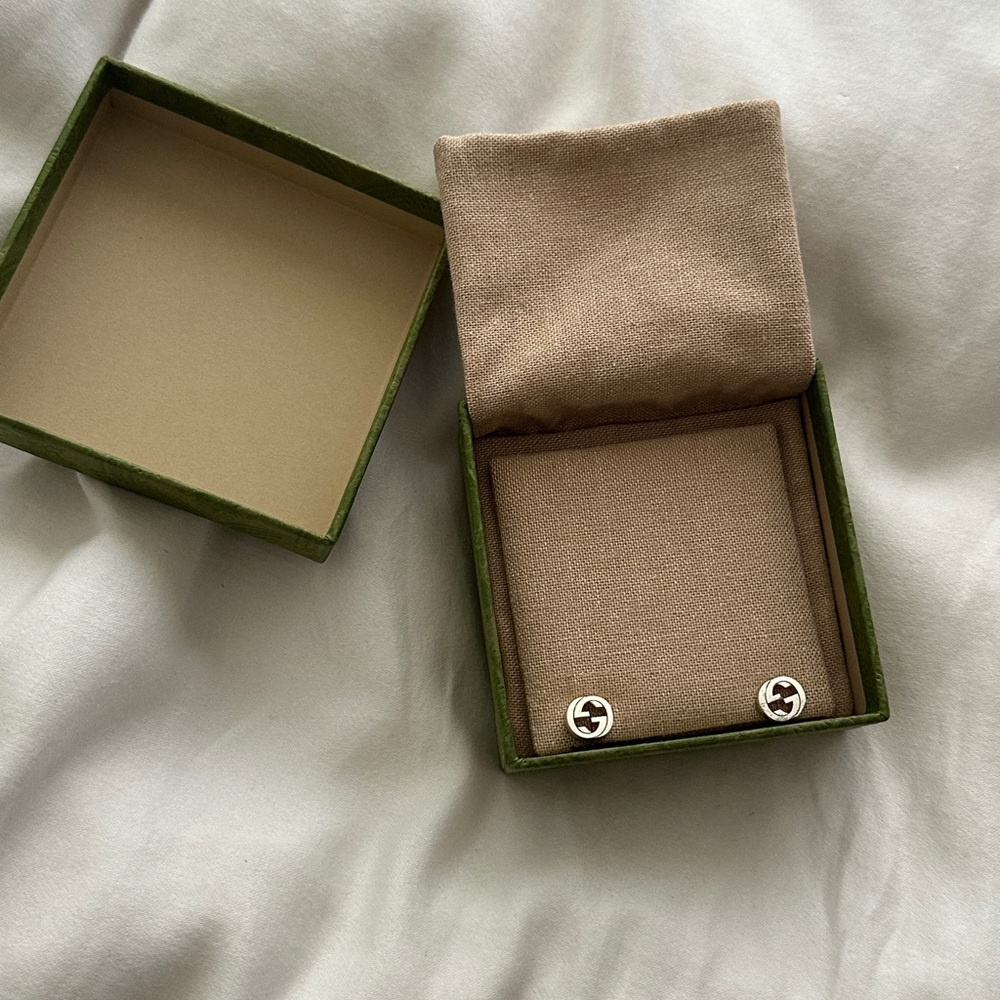 Gucci silver interlocking stud earrings